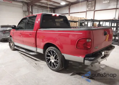 2003 Ford F-150 Lariat/Xlt z USA, uszkodzony, nr VIN 1FTRW07L33KB82002